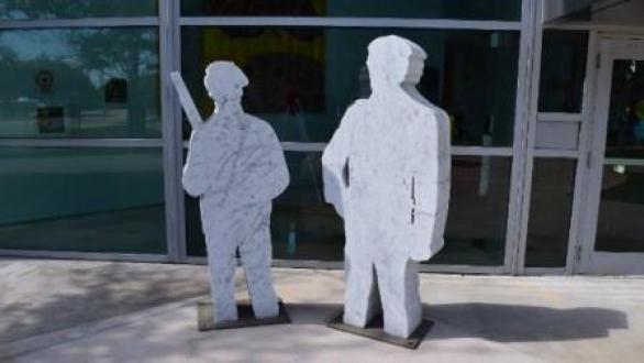 Daniel Joseph Martinez, A meditation on the possibility of romantic love or where are you going with that gun in your hand, Bobby Seale and Huey Newton discuss the relationships between expressionism and social reality present in Hitler’s paintings, 2007, Marble with steel base, The Frost Art Museum, Courtesy of Debra and Dennis Scholl, FIU L2010.2a,b