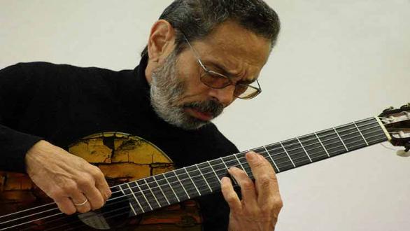 artista con guitarra