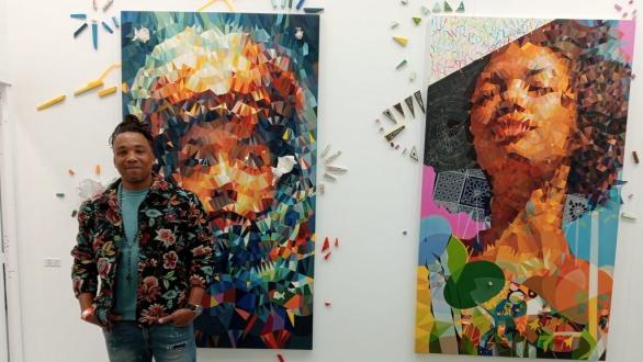 David Planas junto a su obra en Art Madrid 2024