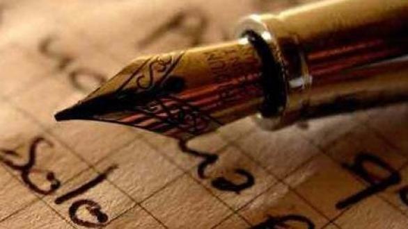 pluma sobre escritura