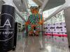 Viktor Freso's 30-foot "Bear Sculpture," commanding attention at the lobby entrance of the LA Art Show.