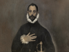 El caballero de la mano en el pecho de El Greco, retratado con gesto serio, vestimenta negra y la mano derecha sobre el torso